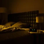 Empty bed at night
